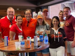 EdwardsSchoen attending a football game with clients