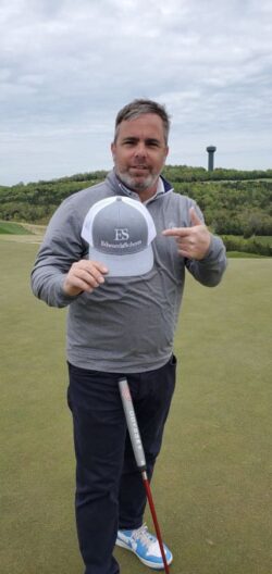 A client on a golf trip with ES